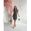 Легка чорна сукня з білими ромашками по коліно з поясом
